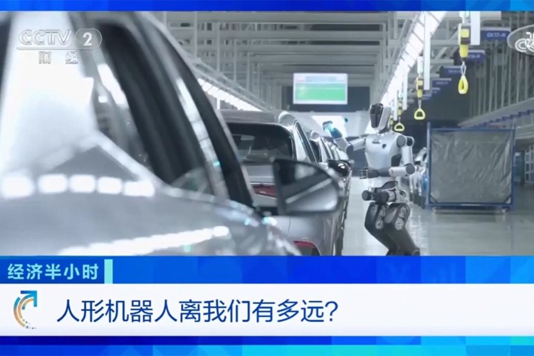 中央电视台《经济半小时》栏目对太阳成集团tyc机器人的专题报道